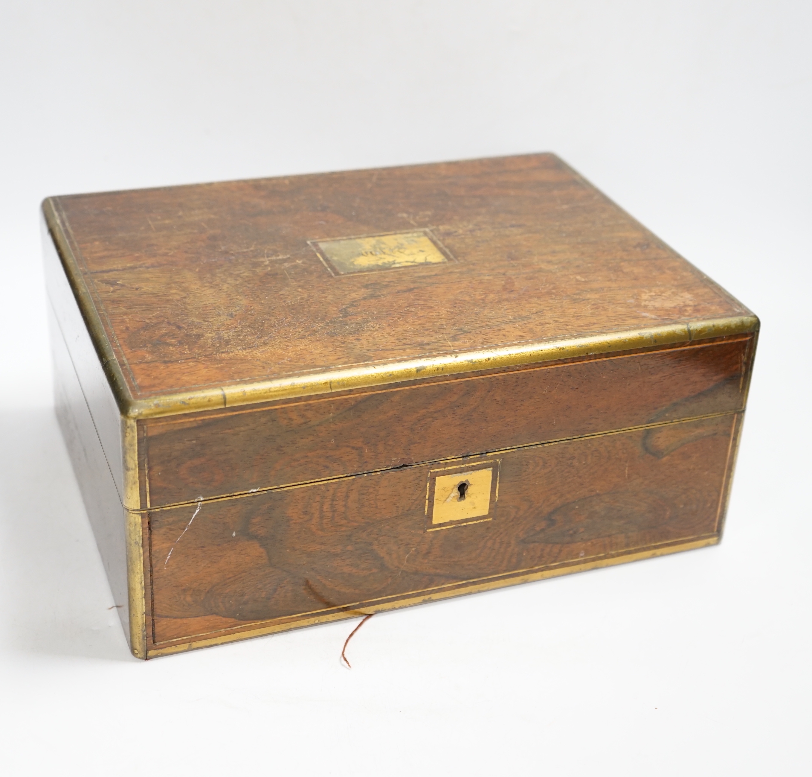 A Victorian rosewood brass bound toilet box, with silver plate mounted bottles and Amber and Jet beads box, 31.5cm wide x 14cm high